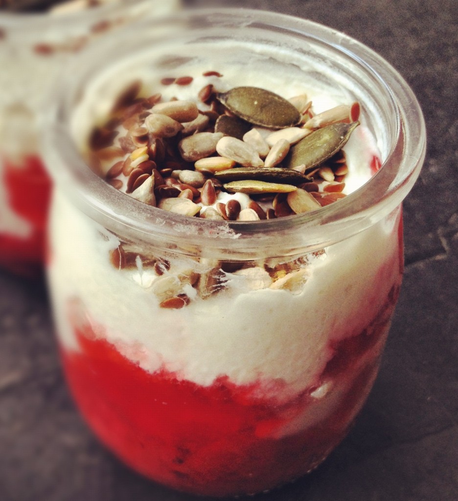 Greek-style yoghurt with strawberry puree and mixed seeds